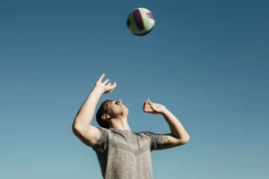 Man playing as volleyball outside hitter in the game