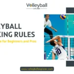 Volleyball hitter hitting ball while blocker is blocking it following volleyball blocking rules