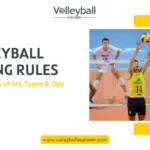 A setter setting volleyball in accordance with volleyball setting rules.